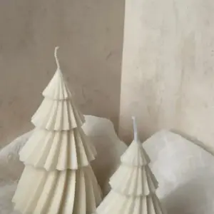Vela en forma de pino